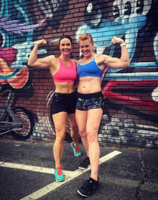 jenn and friend flexing portrait 